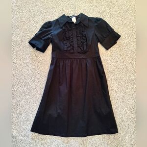 Adorable short sleeve ruffled cotton dress. Cute, comfy and stylish. Size 9/10